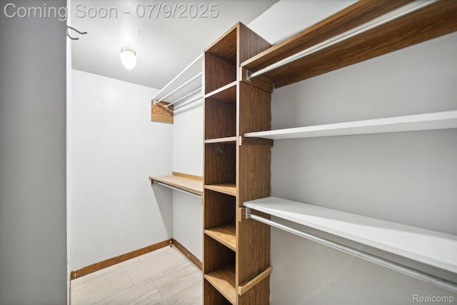 30590 Lorraine Ave, Warren, MI 48093 - walk in closet with light tile patterned flooring