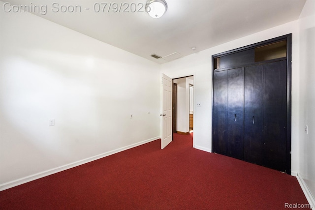30590 Lorraine Ave, Warren, MI 48093 - unfurnished bedroom with dark carpet and a closet