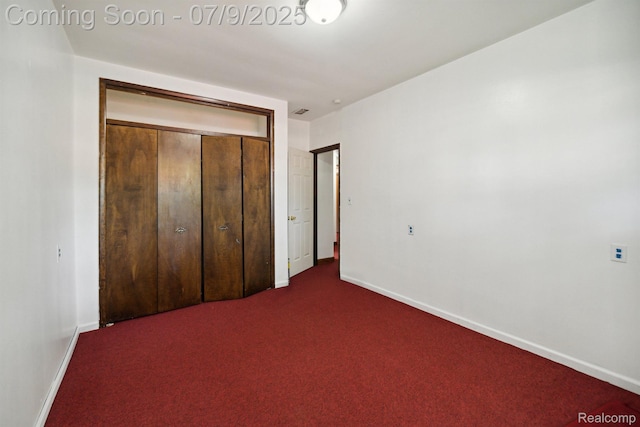 30590 Lorraine Ave, Warren, MI 48093 - unfurnished bedroom with dark carpet and a closet