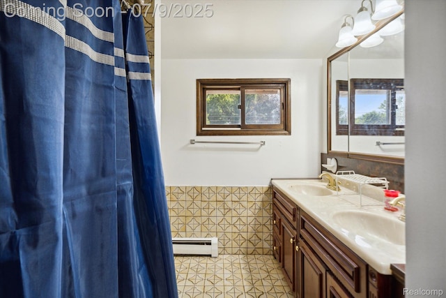 30590 Lorraine Ave, Warren, MI 48093 - full bath featuring a baseboard radiator and double vanity
