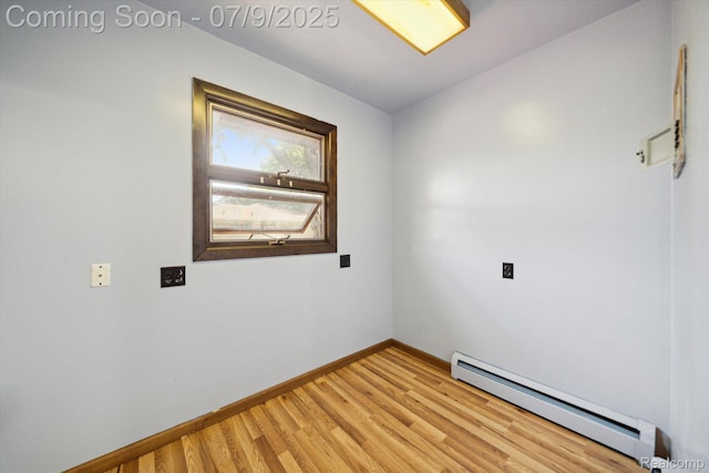 30590 Lorraine Ave, Warren, MI 48093 - empty room with baseboard heating and light wood-type flooring