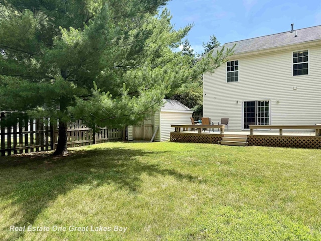 11540 Saddlebrook Cir, Freeland, MI 48623 - view of yard with a deck and a storage shed