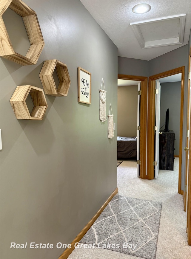 11540 Saddlebrook Cir, Freeland, MI 48623 - corridor featuring attic access and carpet flooring