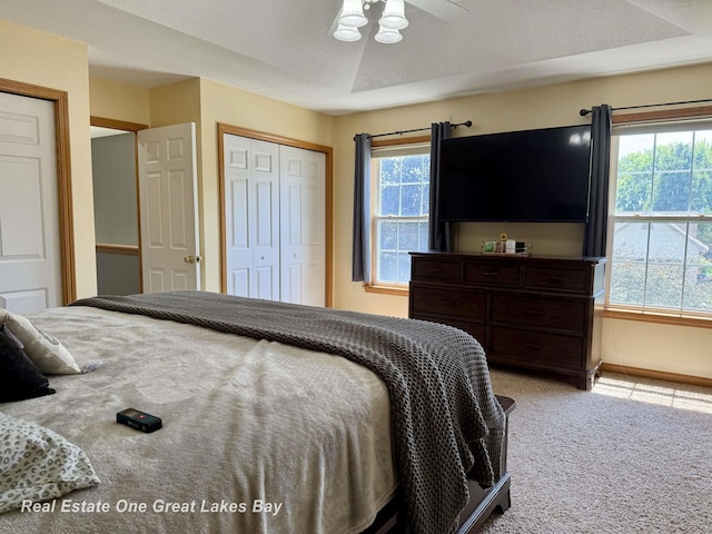 11540 Saddlebrook Cir, Freeland, MI 48623 - carpeted bedroom with a ceiling fan