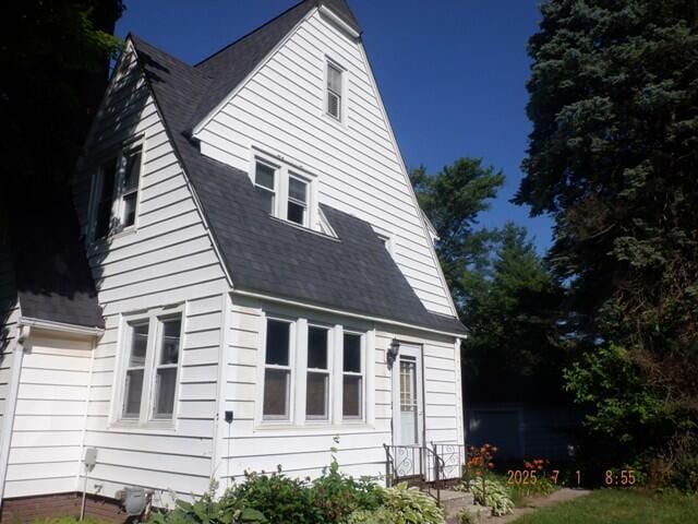 2535 Gull Rd, Kalamazoo, MI 49048 - view of property exterior featuring a shingled roof
