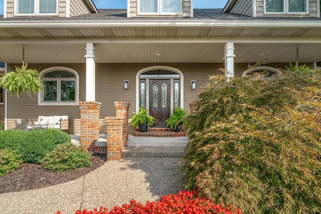 3603 Elk Ct, Zeeland, MI 49464 - entrance to property featuring covered porch and a shingled roof