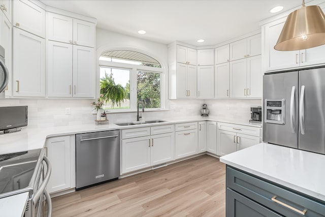 3603 Elk Ct, Zeeland, MI 49464 - kitchen featuring stainless steel appliances, decorative backsplash, recessed lighting, white cabinets, and light countertops
