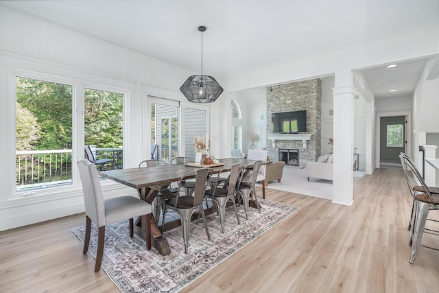3603 Elk Ct, Zeeland, MI 49464 - dining space featuring a fireplace and light wood-type flooring