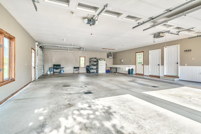 3603 Elk Ct, Zeeland, MI 49464 - garage with a garage door opener and wainscoting