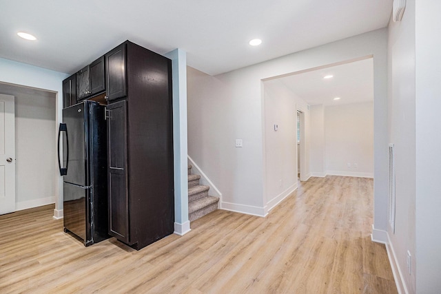 854 First St NW, Grand Rapids, MI 49504 - hall with light wood-style flooring, stairway, and recessed lighting