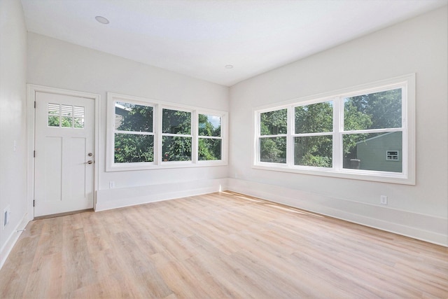 854 First St NW, Grand Rapids, MI 49504 - entrance foyer featuring light wood-style flooring and baseboards