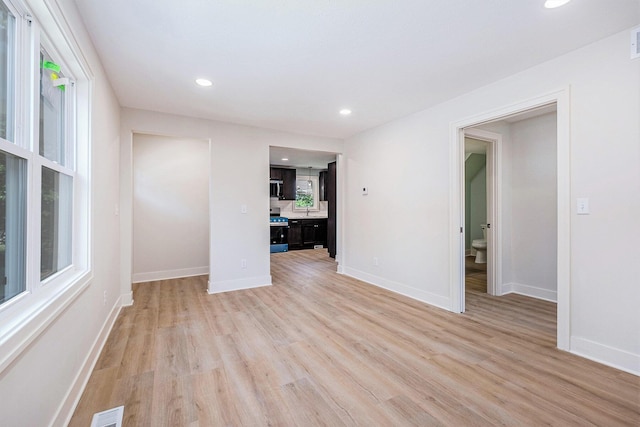 854 First St NW, Grand Rapids, MI 49504 - spare room with recessed lighting and light wood-style flooring