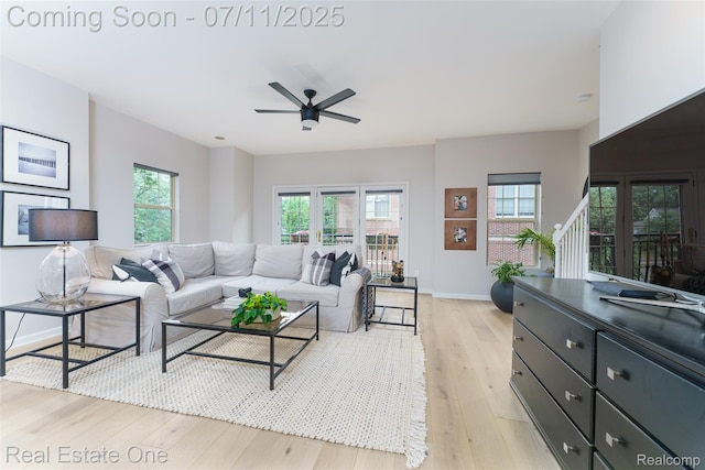 105 S 2nd St, Brighton, MI 48116 - living area featuring light wood-style flooring and ceiling fan