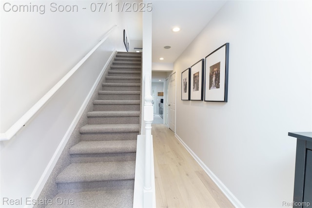 105 S 2nd St, Brighton, MI 48116 - staircase featuring wood finished floors and recessed lighting