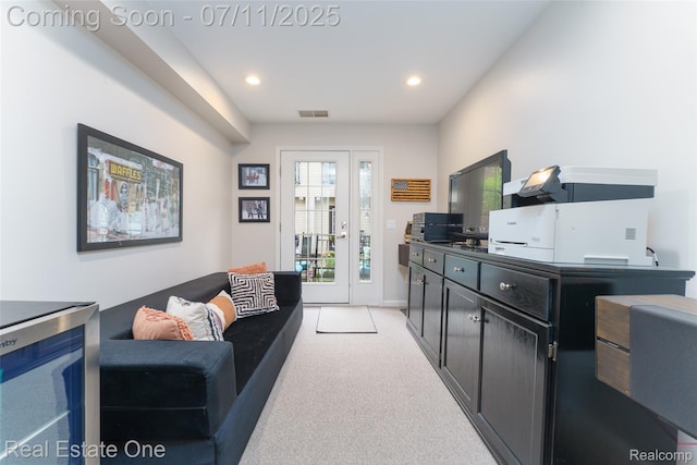 105 S 2nd St, Brighton, MI 48116 - living area with light carpet and recessed lighting