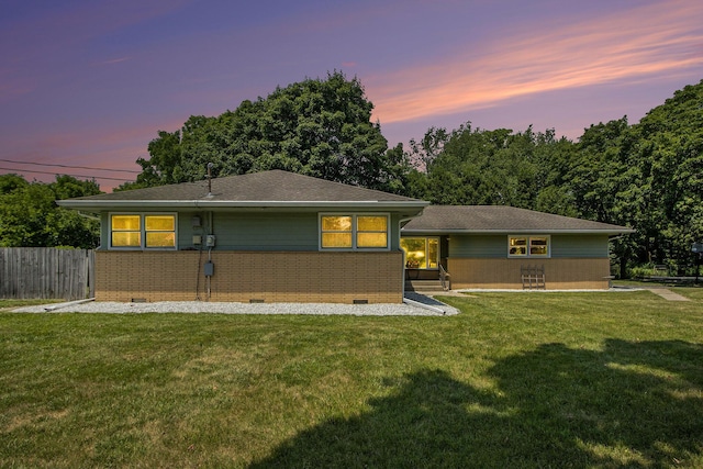 3715 Lancaster Dr, Kalamazoo, MI 49006 - rear view of house featuring crawl space, brick siding, and a shingled roof