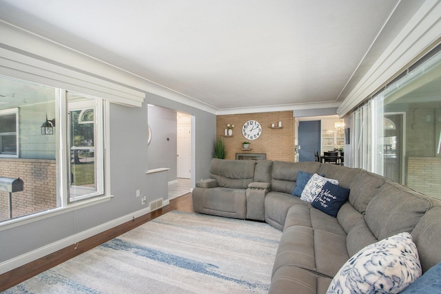 3715 Lancaster Dr, Kalamazoo, MI 49006 - living area featuring wood finished floors and crown molding