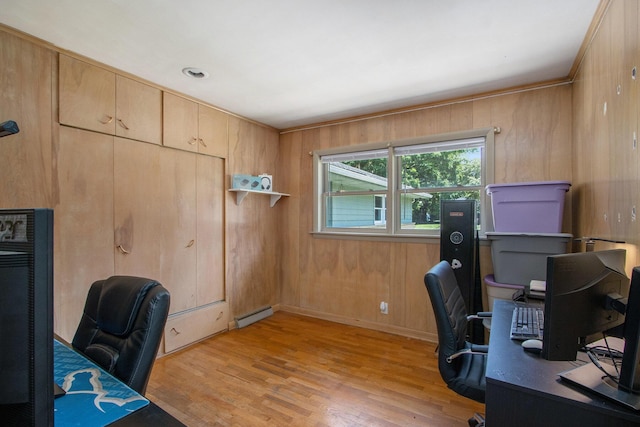 3715 Lancaster Dr, Kalamazoo, MI 49006 - office area featuring baseboard heating, light wood-type flooring, and wooden walls
