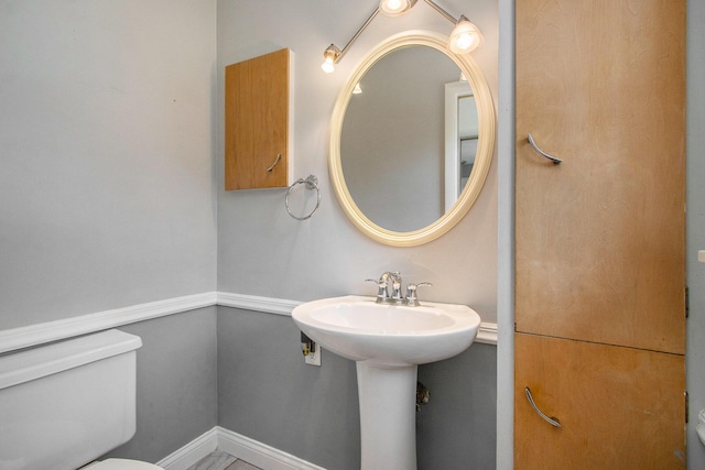 3715 Lancaster Dr, Kalamazoo, MI 49006 - bathroom featuring toilet and a sink