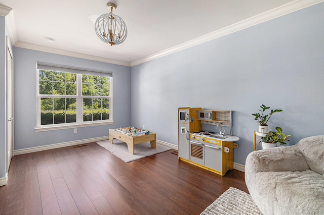 5775 Libby Ct, Dexter, MI 48130 - living area featuring a chandelier, ornamental molding, and dark wood-style floors
