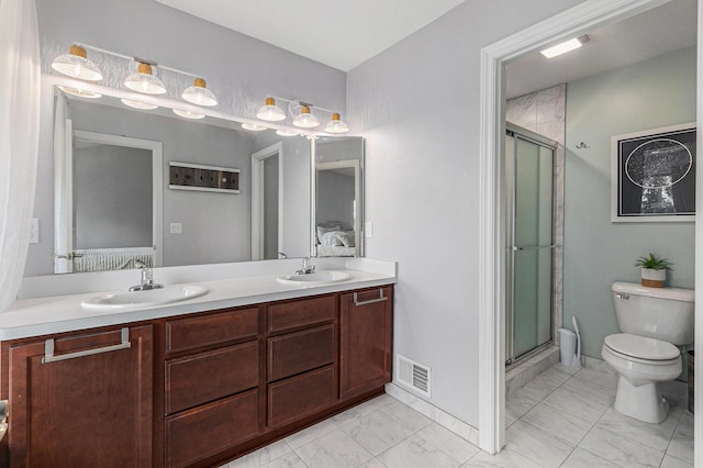 5775 Libby Ct, Dexter, MI 48130 - ensuite bathroom with marble look tiles, double vanity, and a stall shower