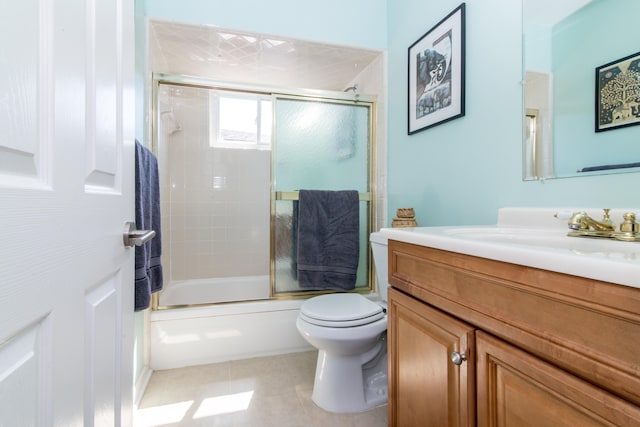 39079 Ross St, Livonia, MI 48154 - bathroom featuring vanity, shower / bath combination with glass door, and tile patterned floors