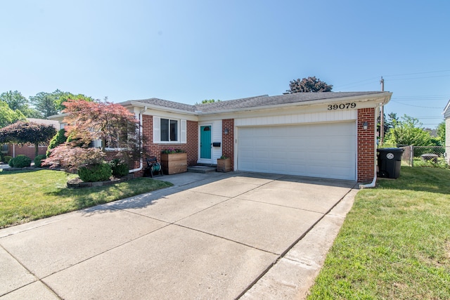 39079 Ross St, Livonia, MI 48154 - ranch-style home with brick siding, a garage, and driveway