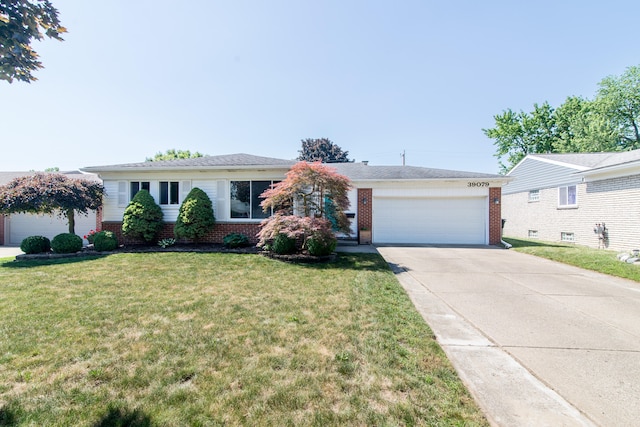 39079 Ross St, Livonia, MI 48154 - single story home featuring brick siding, a garage, driveway, and a front lawn