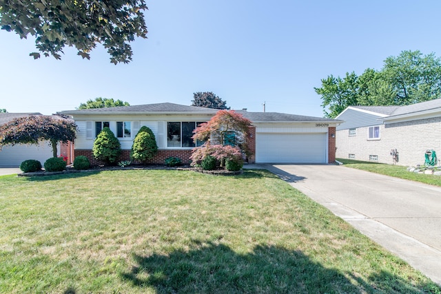 39079 Ross St, Livonia, MI 48154 - single story home featuring brick siding, driveway, a garage, and a front lawn
