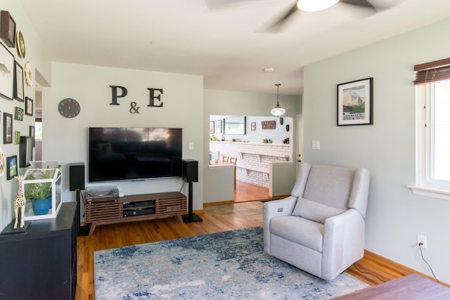 39079 Ross St, Livonia, MI 48154 - living area featuring ceiling fan and wood finished floors