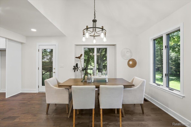 47043 Curtis Rd, Northville, MI 48168 - dining space with a chandelier, dark wood-style flooring, and vaulted ceiling