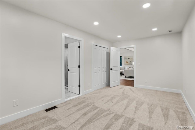 47043 Curtis Rd, Northville, MI 48168 - unfurnished bedroom featuring carpet flooring, recessed lighting, and ensuite bathroom