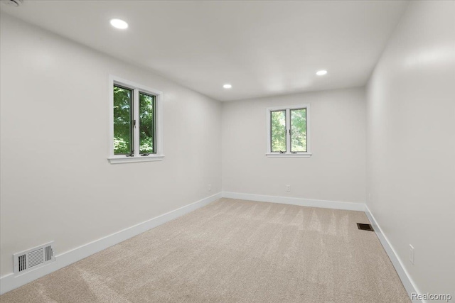 47043 Curtis Rd, Northville, MI 48168 - empty room featuring recessed lighting and light carpet