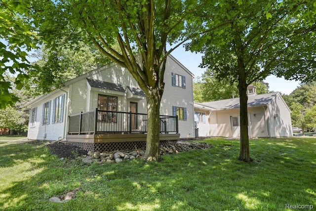 47043 Curtis Rd, Northville, MI 48168 - view of front of house featuring a wooden deck and a front yard