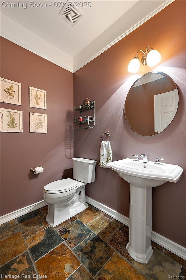 3066 Waldon Park Dr, Orion, MI 48359 - half bath featuring stone tile floors and baseboards