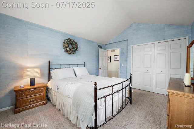 3066 Waldon Park Dr, Orion, MI 48359 - bedroom with lofted ceiling, light colored carpet, and a closet