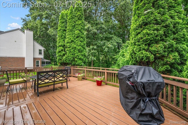 3066 Waldon Park Dr, Orion, MI 48359 - wooden terrace with area for grilling