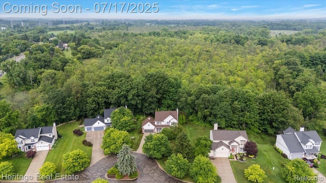 3066 Waldon Park Dr, Orion, MI 48359 - aerial view of residential area with a forest