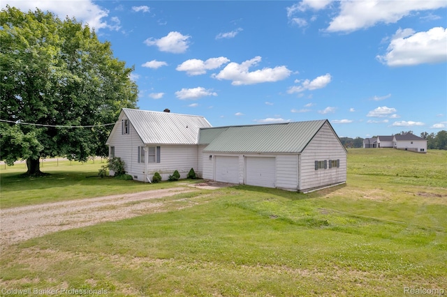 4677 Imlay City Rd, Attica, MI 48412 - view of property exterior with a yard, a metal roof, and dirt driveway