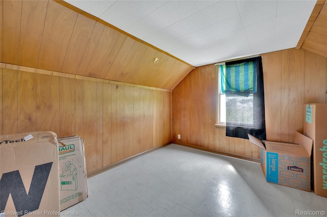 4677 Imlay City Rd, Attica, MI 48412 - additional living space with wood walls, vaulted ceiling, and tile patterned floors