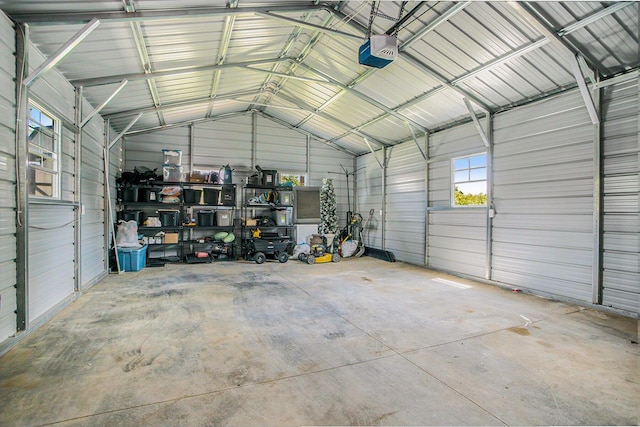 320 E Dr, Marshall, MI 49068 - garage with a garage door opener and metal wall