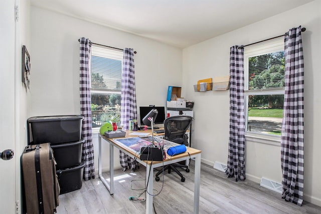 320 E Dr, Marshall, MI 49068 - home office featuring wood finished floors and plenty of natural light