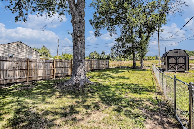 320 E Dr, Marshall, MI 49068 - fenced backyard with a shed