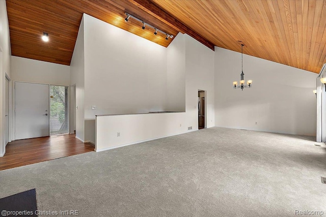 2 Eastbury Ct, Ann Arbor, MI 48105 - unfurnished living room with wood ceiling, carpet floors, a chandelier, high vaulted ceiling, and track lighting