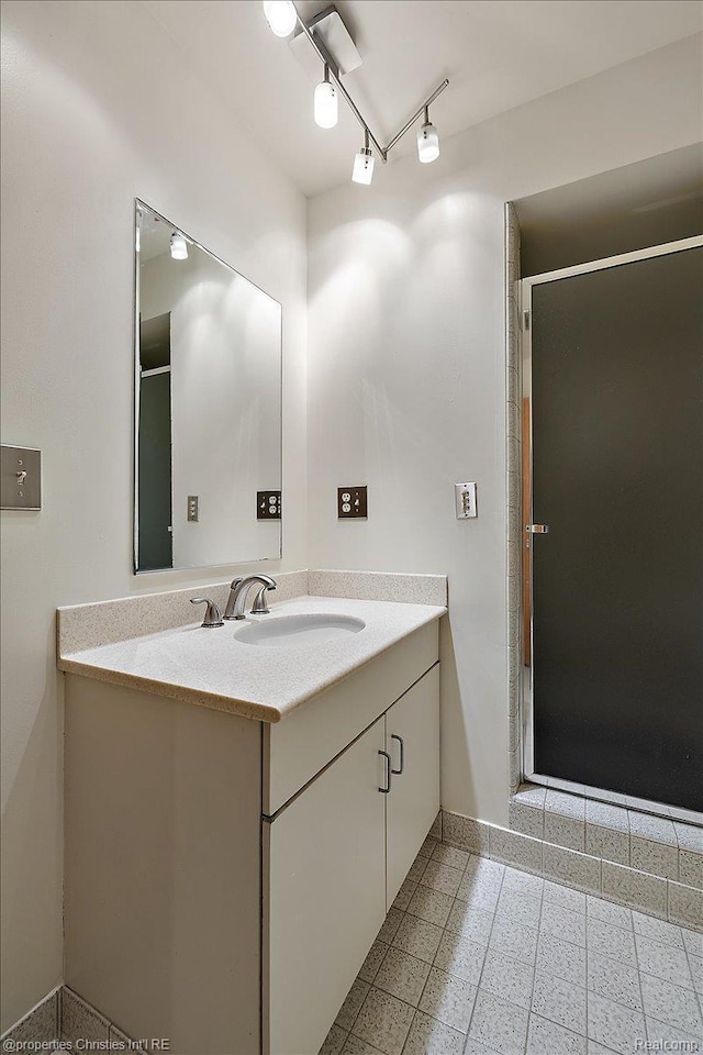 2 Eastbury Ct, Ann Arbor, MI 48105 - bathroom with vanity and a stall shower