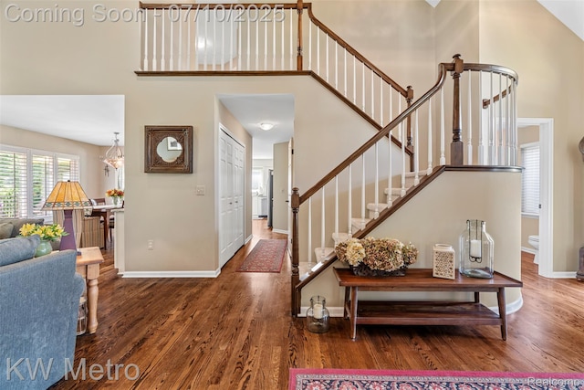 510 Roxbury Dr, Lake Orion, MI 48359 - entrance foyer featuring a high ceiling, wood finished floors, and stairs