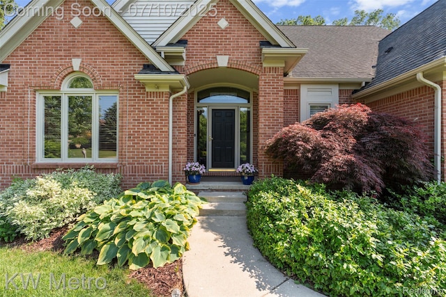 510 Roxbury Dr, Lake Orion, MI 48359 - entrance to property featuring brick siding and a shingled roof