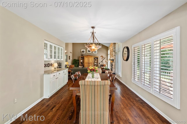 510 Roxbury Dr, Lake Orion, MI 48359 - dining room featuring dark wood finished floors and a chandelier