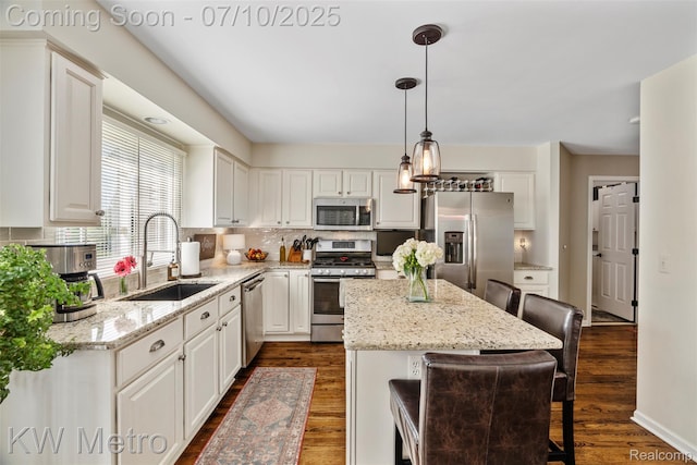510 Roxbury Dr, Lake Orion, MI 48359 - kitchen with stainless steel appliances, dark wood-style floors, and white cabinetry
