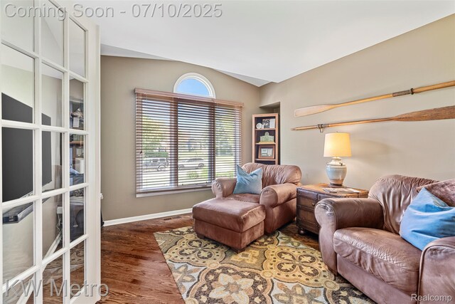 510 Roxbury Dr, Lake Orion, MI 48359 - living room with vaulted ceiling and wood finished floors